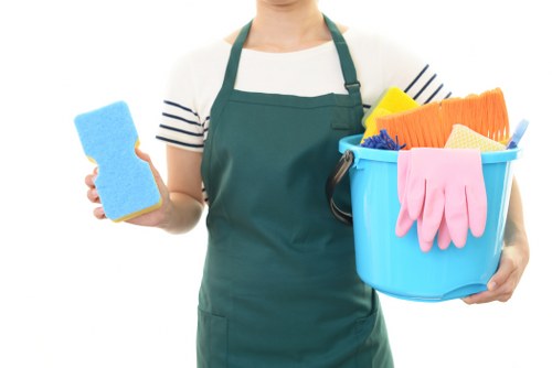 Carpet cleaning team preparing equipment safely before a job