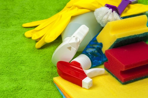 Local oven cleaner working in a Brixton flat kitchen
